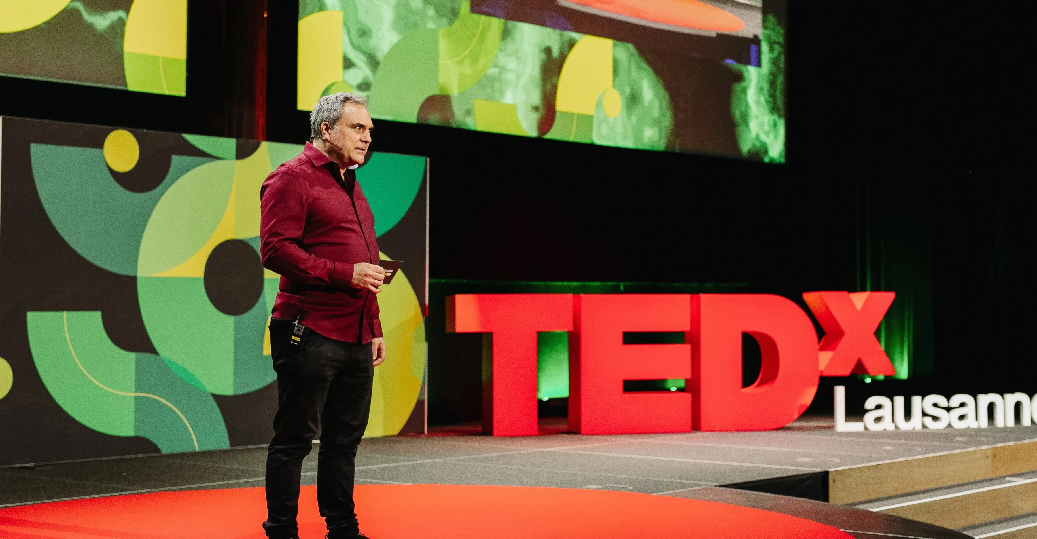 Damien Gauthier on stage at TEDxLausanne 2026
